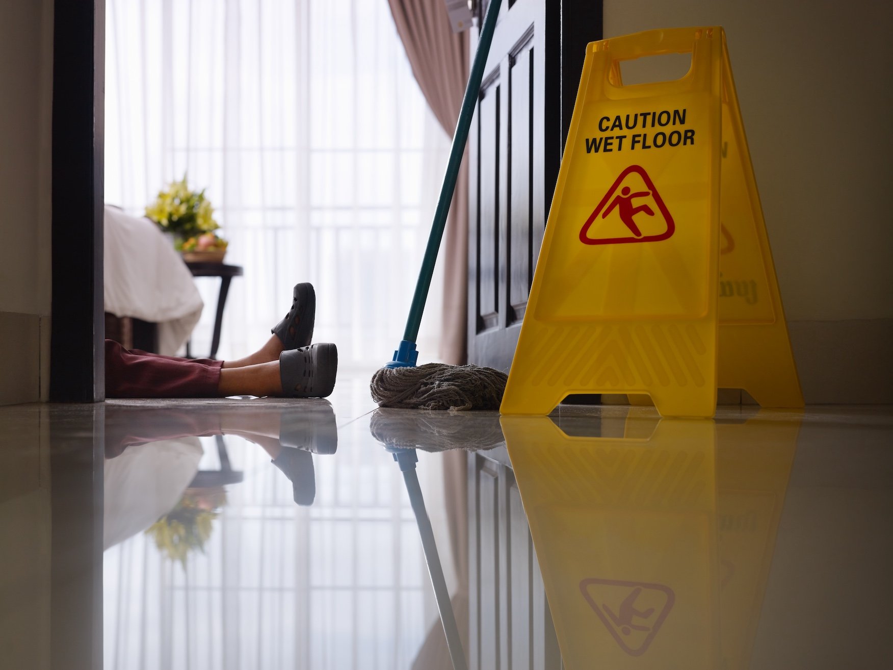 maid-slipped-on-wet-floor-and-laying-down-2025-01-16-13-06-26-utc