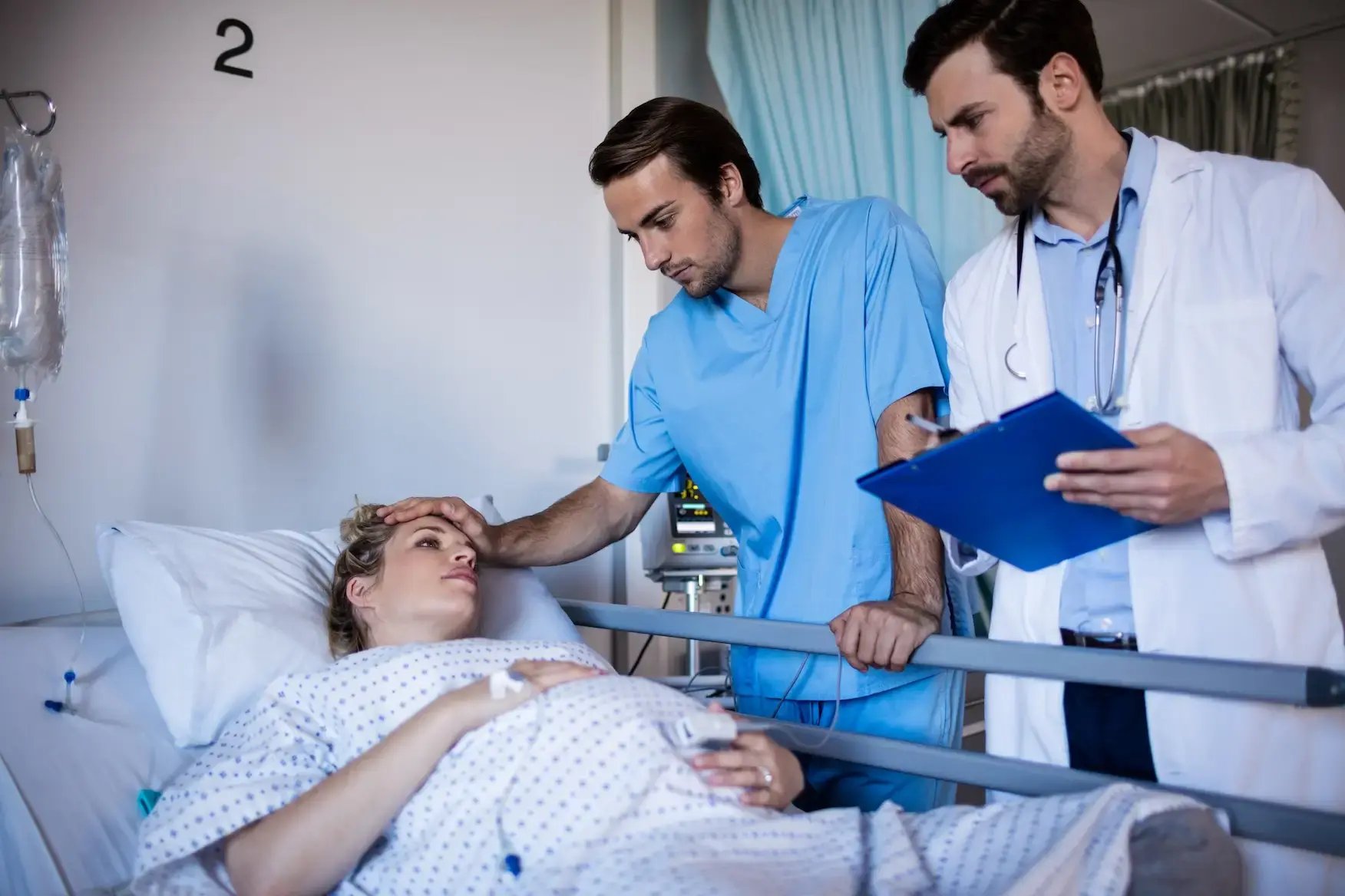 team-of-doctors-interacting-with-pregnant-woman-2025-04-05-06-02-01-utc