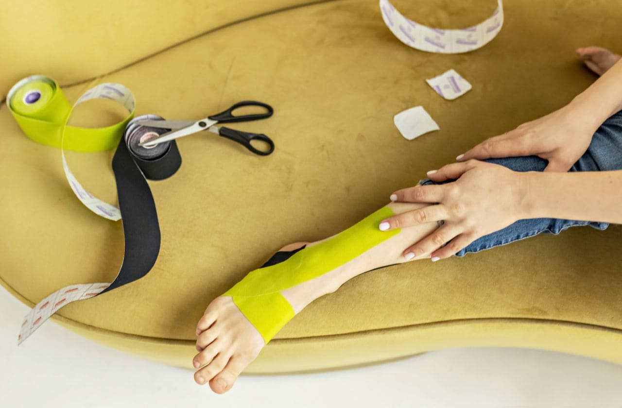 a-woman-is-sitting-on-the-sofa-gluing-medical-tap