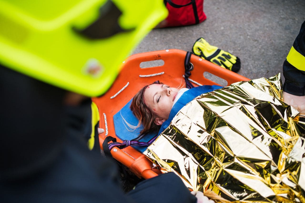an-injured-woman-in-a-plastic-stretcher