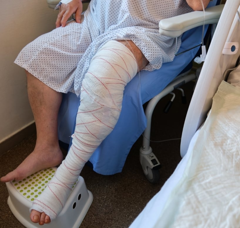 patient-recovering-in-hospital-bed-with-bandaged-l-2025-06-03-15-20-19-utc